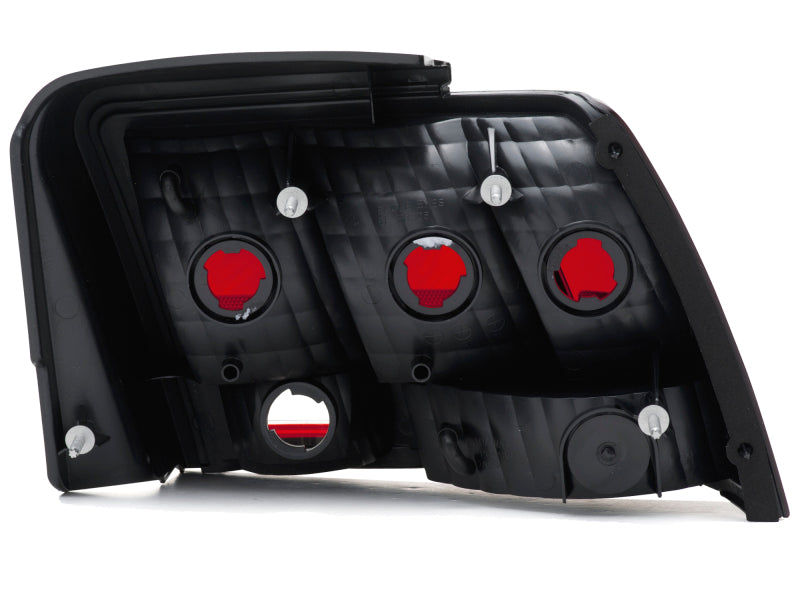 Raxiom 99-04 Ford Mustang Excluding 99-01 Cobra Tail Lights- Black Housing (Smoked Lens)