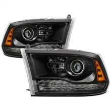 Load image into Gallery viewer, xTune Dodge Ram 13-17 ( w/ Factory Projector LED) Projector Headlight - Black HD-JH-DR13-P-BK