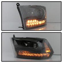 Load image into Gallery viewer, xTune Dodge Ram 13-17 ( w/ Factory Projector LED) Projector Headlight - Black HD-JH-DR13-P-BK