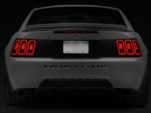 Load image into Gallery viewer, Raxiom 99-04 Ford Mustang Excluding 99-01 Cobra Icon LED Tail Lights- Black Housing (Smoked Lens)